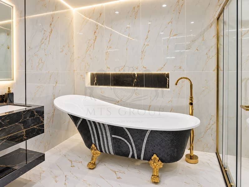 16 Luxurious Marble Clawfoot Bathroom. png