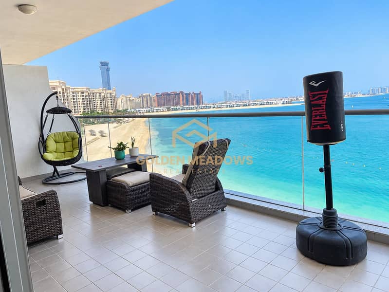 2 Bright Oceanfront Balcony with Punching Bag. png
