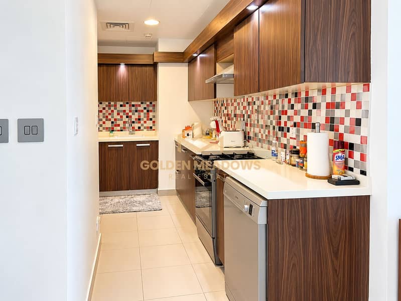 7 Modern Walnut Galley Kitchen. png