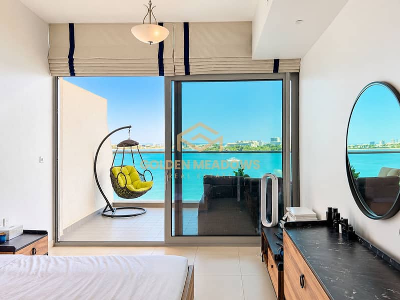 9 Modern Bedroom with Turquoise Sea View. png