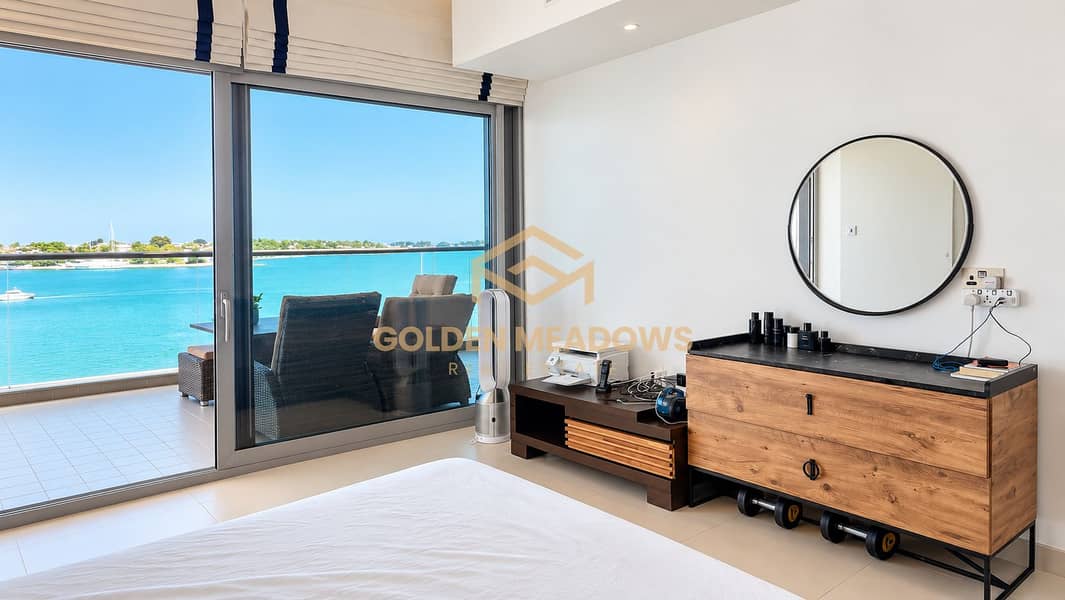 12 Modern Bedroom with Waterfront View. png