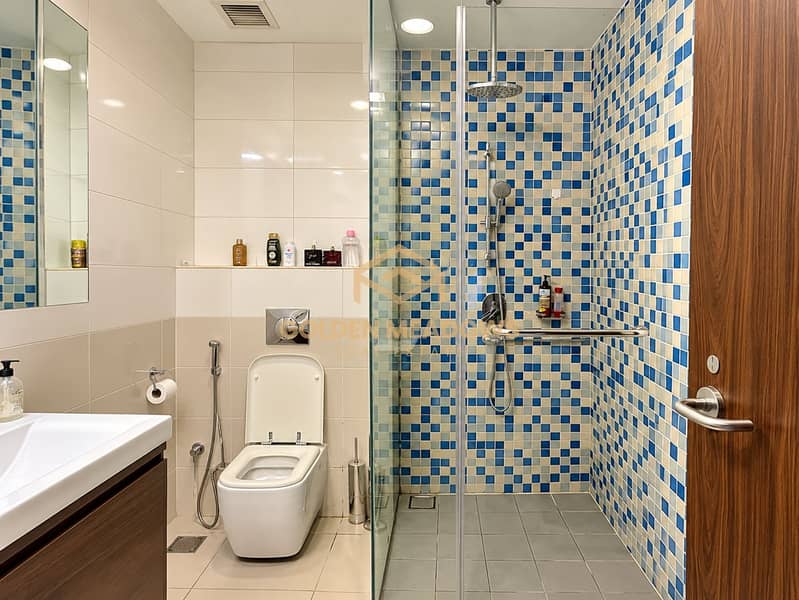 14 Modern Mosaic-Tile Bathroom Retreat. png