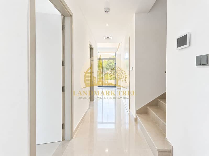 7 Bright Minimalist Hallway to Garden. png