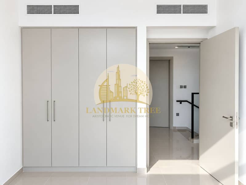 12 Minimalist Wardrobe and Open Hallway. png