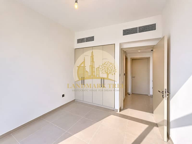 14 Sunlit Minimalist Bedroom with Built-In Wardrobe. png