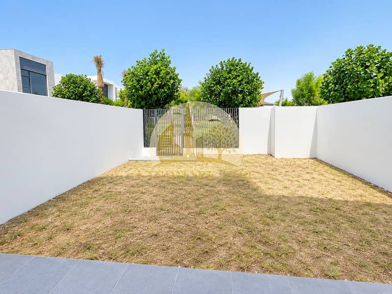 19 Modern Courtyard with Sparse Lawn. png