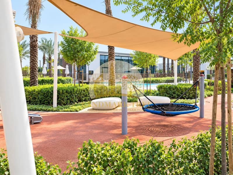 20 Sunny Resort Playground with Nest Swing. png