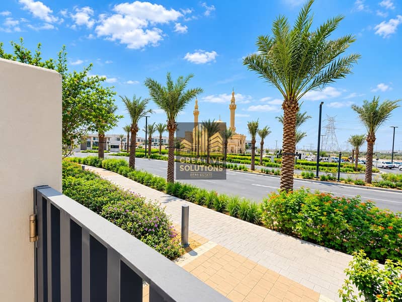 3 Palm-Lined Streetscape with Mosque Views. png