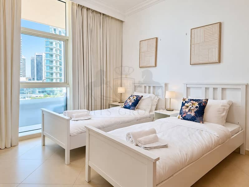 6 Bright Twin Bedroom with City Views. png