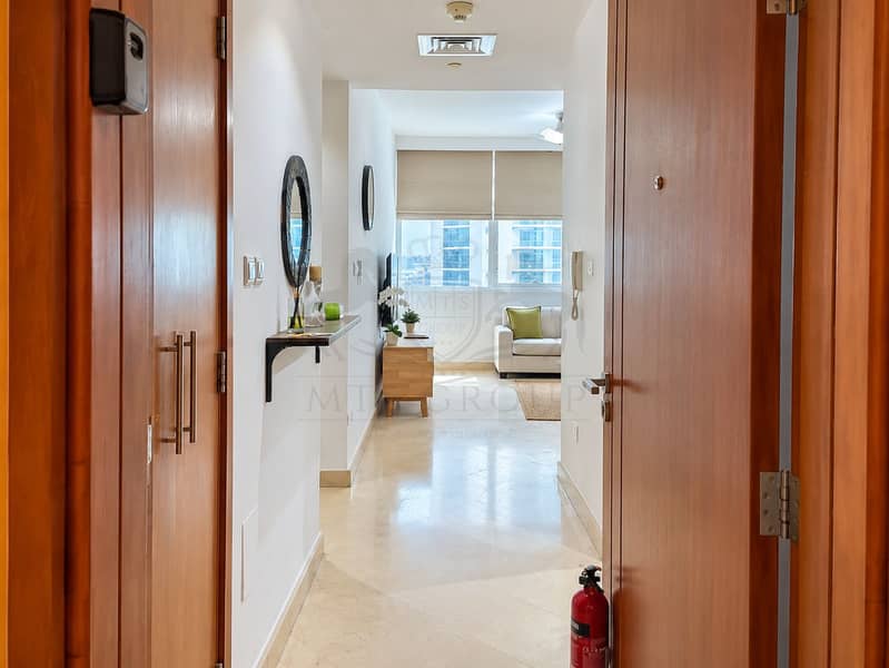 8 Modern Hallway Framing a Bright City Living Room. png