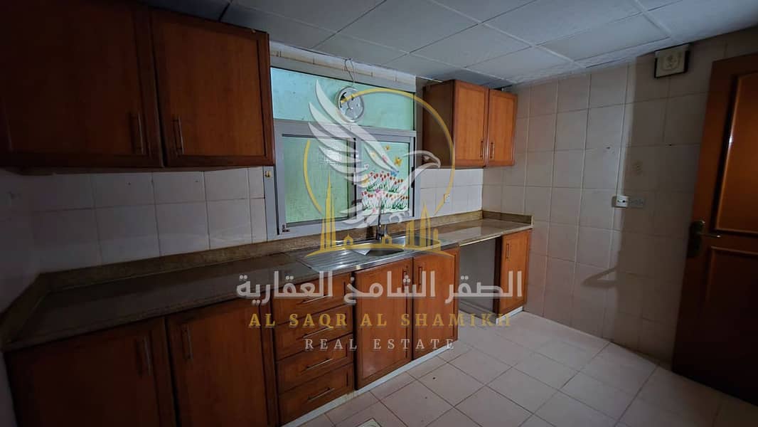 12 shqa-for-rent-2-bedroom-albwtyna-alsharqa-kitchen-10. jpg