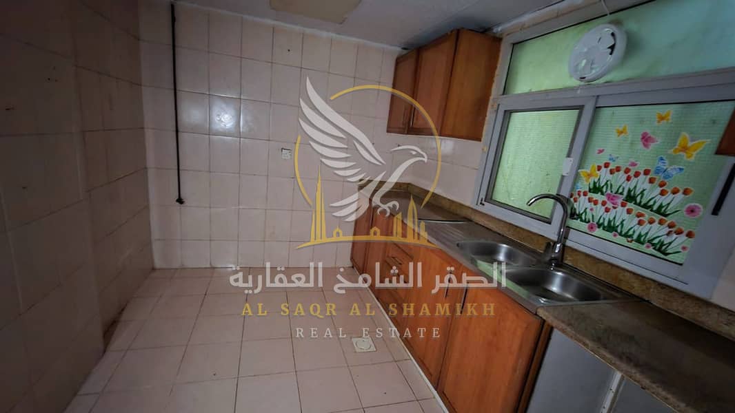 13 shqa-for-rent-2-bedroom-albwtyna-alsharqa-kitchen-07. jpg