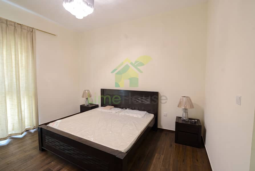12 05-dubai-al-furjan-azizi-liatris-1-bedroom-apartment-master-bedroom-wide-view. jpg