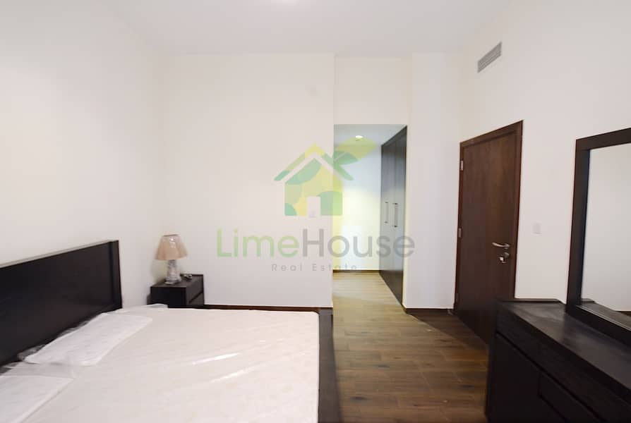 14 08-dubai-al-furjan-azizi-liatris-1-bedroom-apartment-master-bedroom-ensuite-wardrobe. jpg