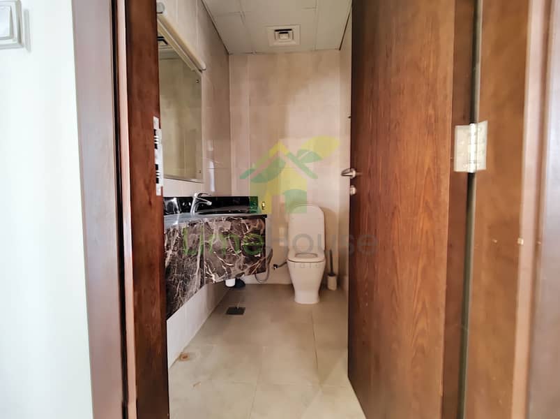 15 10-dubai-al-furjan-azizi-liatris-1-bedroom-apartment-guest-bathroom-marble-vanity. jpg
