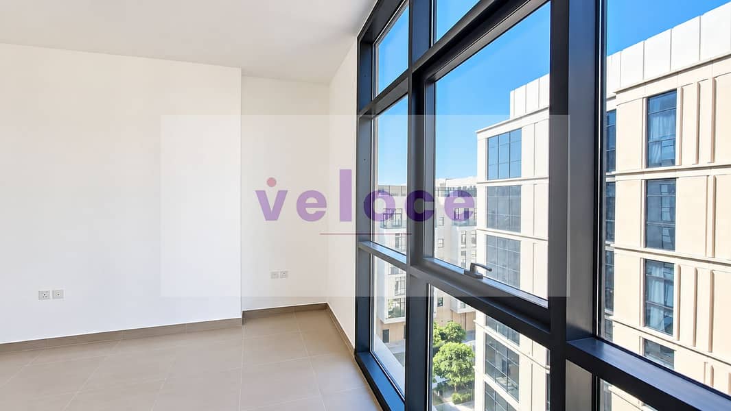 6 Bright Minimalist Room with Urban Views. png