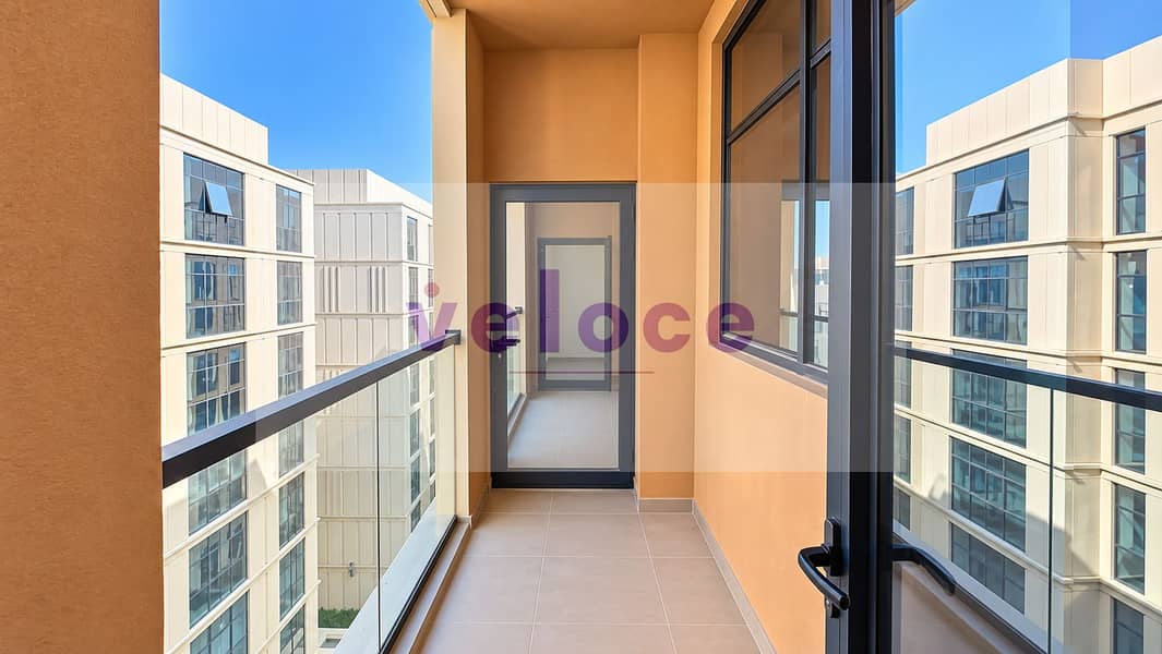 15 Modern Sunlit Apartment Balcony. png