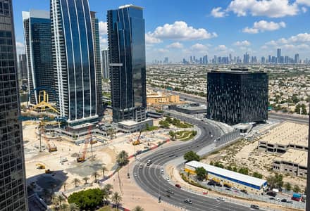1 Camera Appartamento in affitto a Jumeirah Lake Towers (JLT), Dubai - Modern Skyline Over Construction District. png