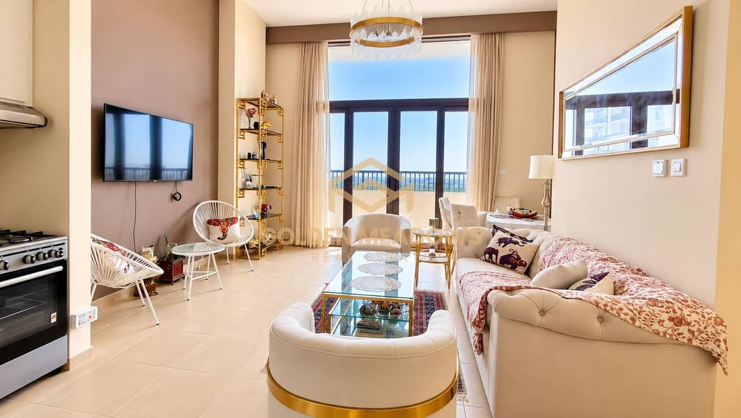 2 Sunlit Elegant Living Room with Balcony Views. png
