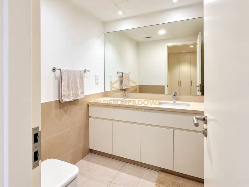 12 Bright Minimalist Double-Vanity Bathroom. png