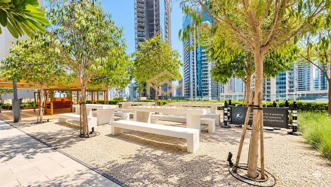 9 Sunny Rooftop Workspace Courtyard. png