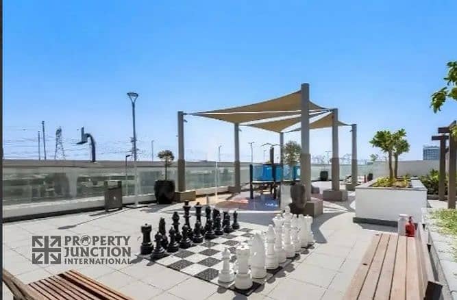 8 AziziRiver8_Amenity_Rooftop_Chess. png