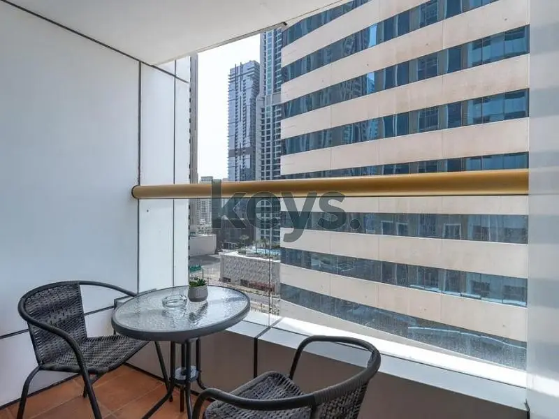 1BR Furnished | Partial Sea View | Prime Location