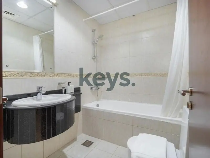 1BR Furnished | Partial Sea View | Prime Location