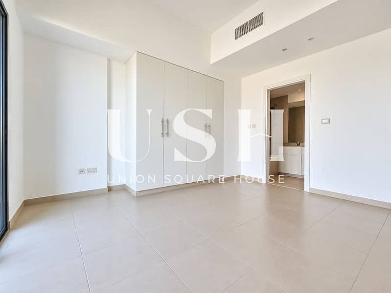 5 Bright Minimalist Bedroom with En-Suitealcove. png