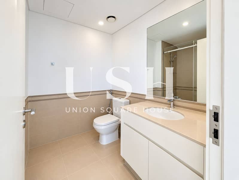 6 Bright Minimalist Beige Bathroom. png