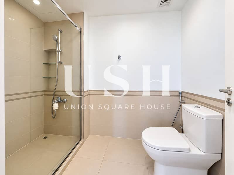 11 Modern Beige-Tiled Bathroom. png