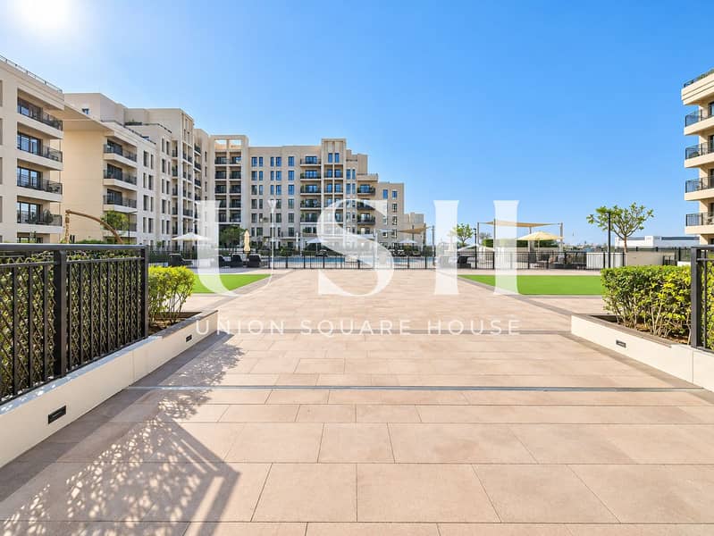 16 Sunlit Modern Courtyard Promenade. png
