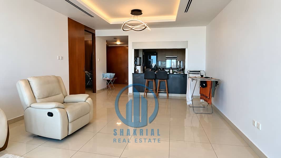 3 Bright Modern Living Room and Kitchen Interior. png