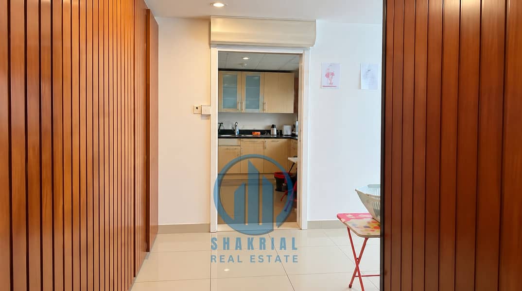 8 Warm Wood Hallway to Kitchen. png