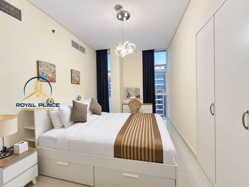 8 Brightened furnished bedroom with chandelier. png