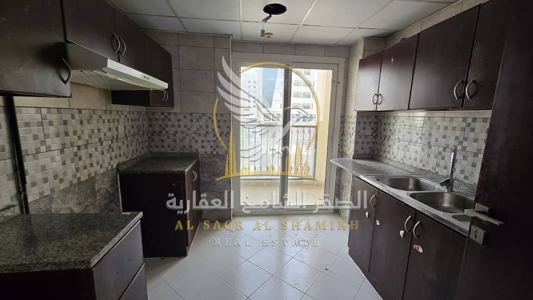 14 shqa-for-rent-2-bedroom-alqlyaa-alsharqa-kitchen-08. jpg