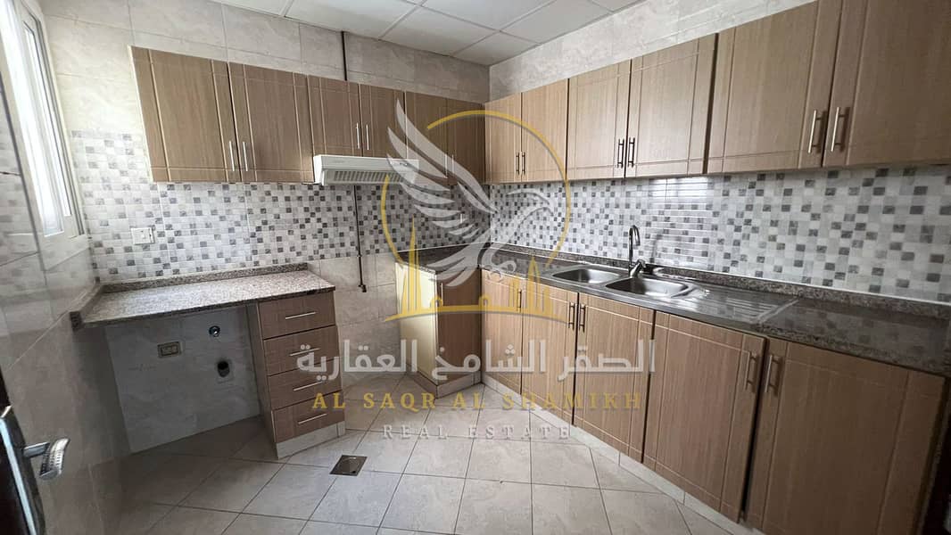 11 غرفة-وصالة-للا-يجار-1-غرف-القليعة-الشارقة-صورة-العقار-tr-001-01. jpg
