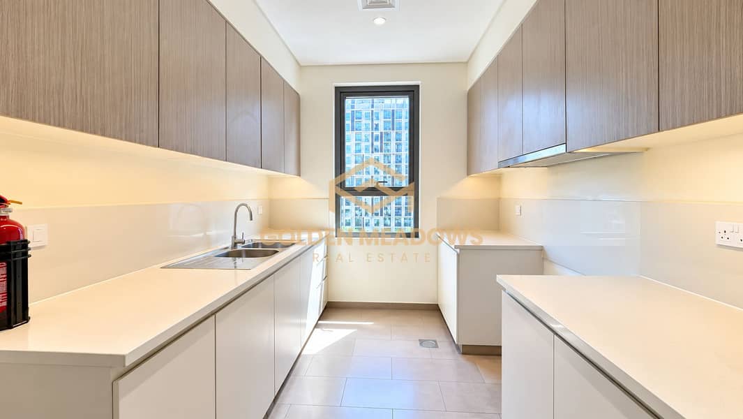 5 Contemporary Galley Kitchen with City View. png