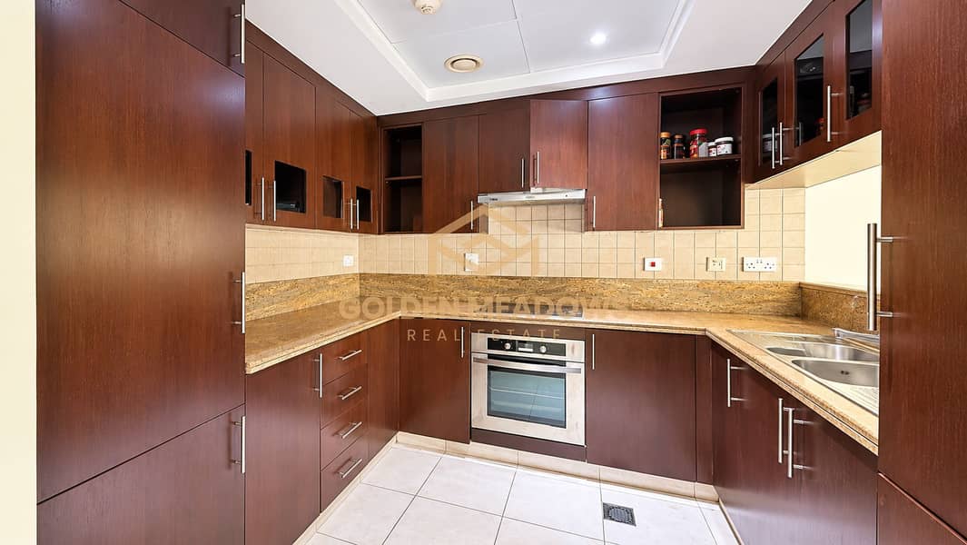 6 Modern Espresso U-Shaped Kitchen. png