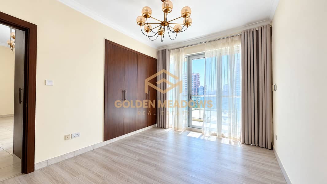 8 Bright Modern Bedroom with Balcony View. png