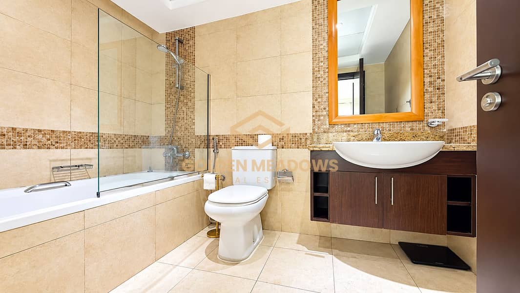 11 Bright Modern Beige Tiled Bathroom. png