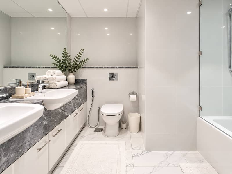 15 Glamorous marble hotel bathroom. png
