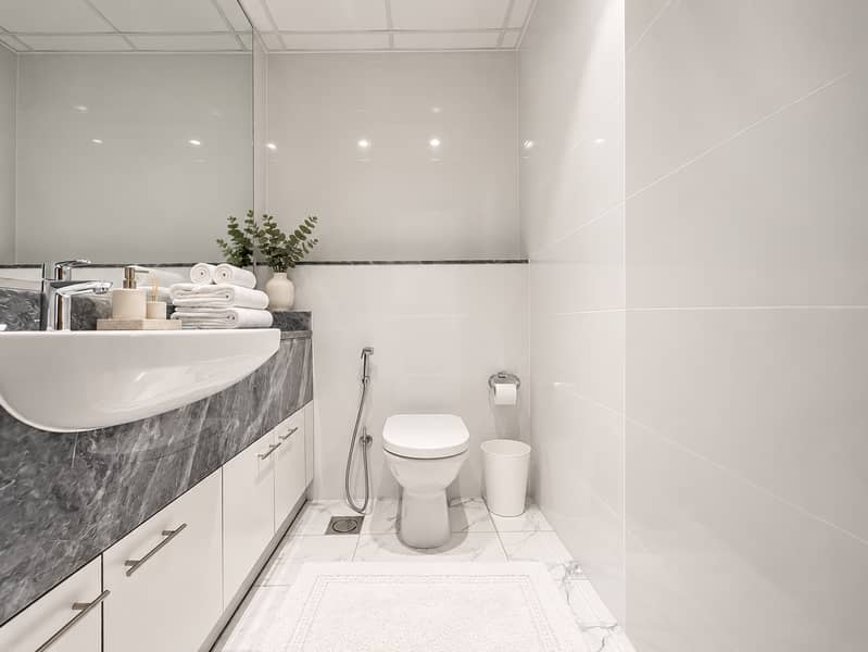 18 Refined grey marble powder room. png