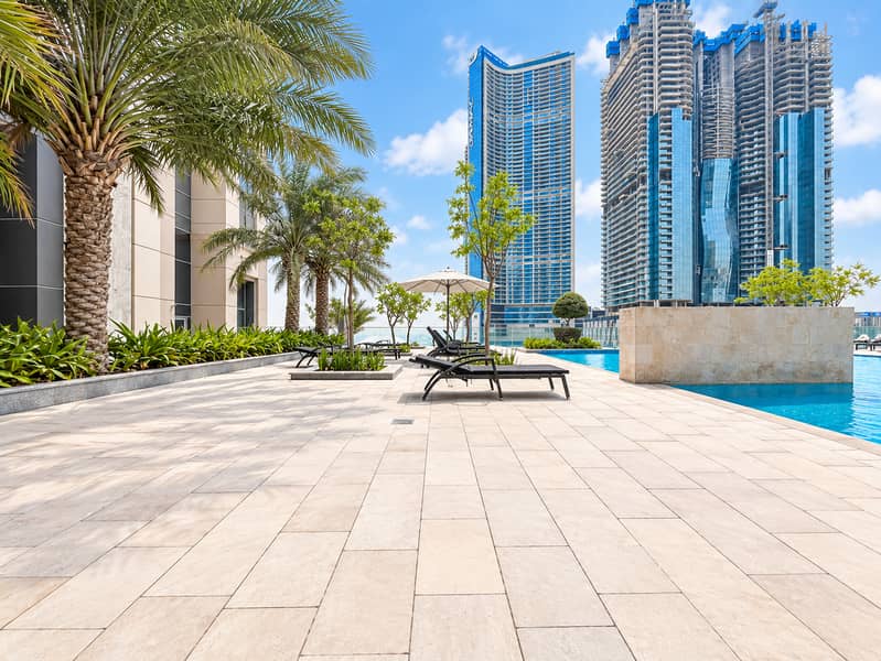 22 Elegant Poolside Terrace With Skyline Views. png