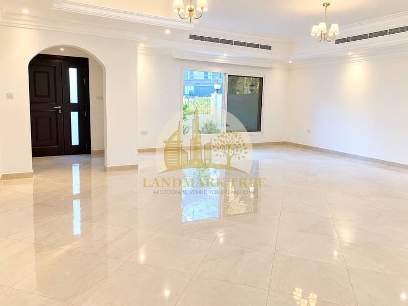 Elegant Empty Living Room with Glossy Floors. png Elegant Empty Living Room with Glossy Floors. png