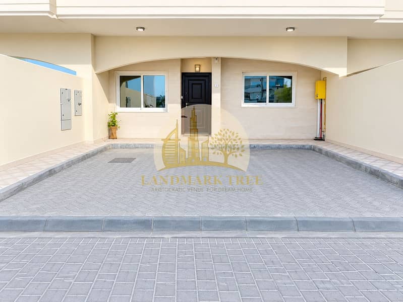 2 Modern Cream Stucco Home Entrance. png