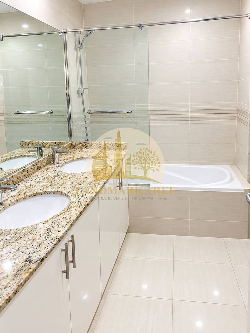 8 Modern Beige Tile Bathroom Retreat. png