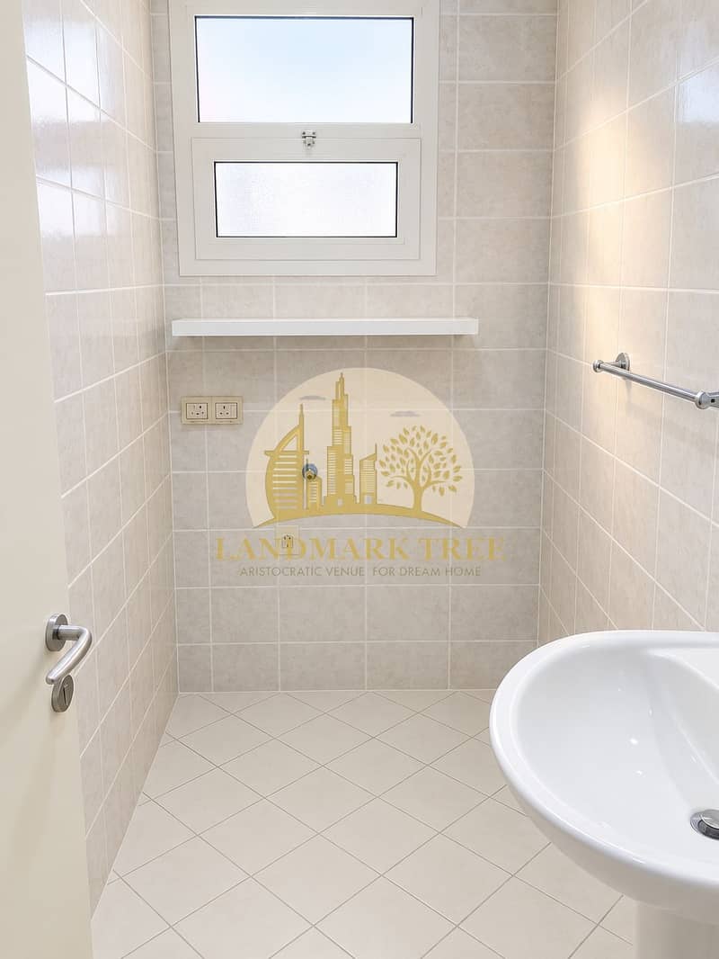 12 Bright Minimal Tiled Utility Bathroom. png