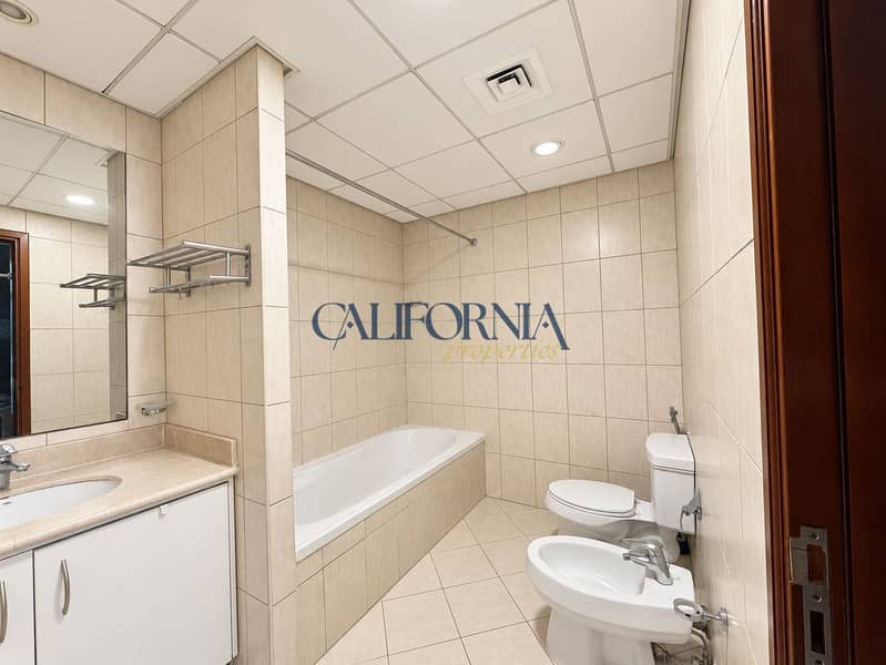 5 Bright, clutter-free bathroom in neutral tones. png