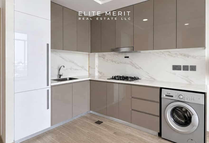 4 Modern Taupe Kitchen with Marble Backsplash. jpg